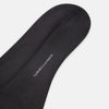View 3 of product A single Sage Silk Long Sock by Turnbull & Asser, in black, is displayed from a side angle against a plain white background.