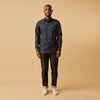 View 6 of product The Turnbull & Asser Blue Weekend Fit Finch Shirt features a Derby collar, chest pocket, classic white buttons, and timeless style, all in cotton. Laid flat on a white background.