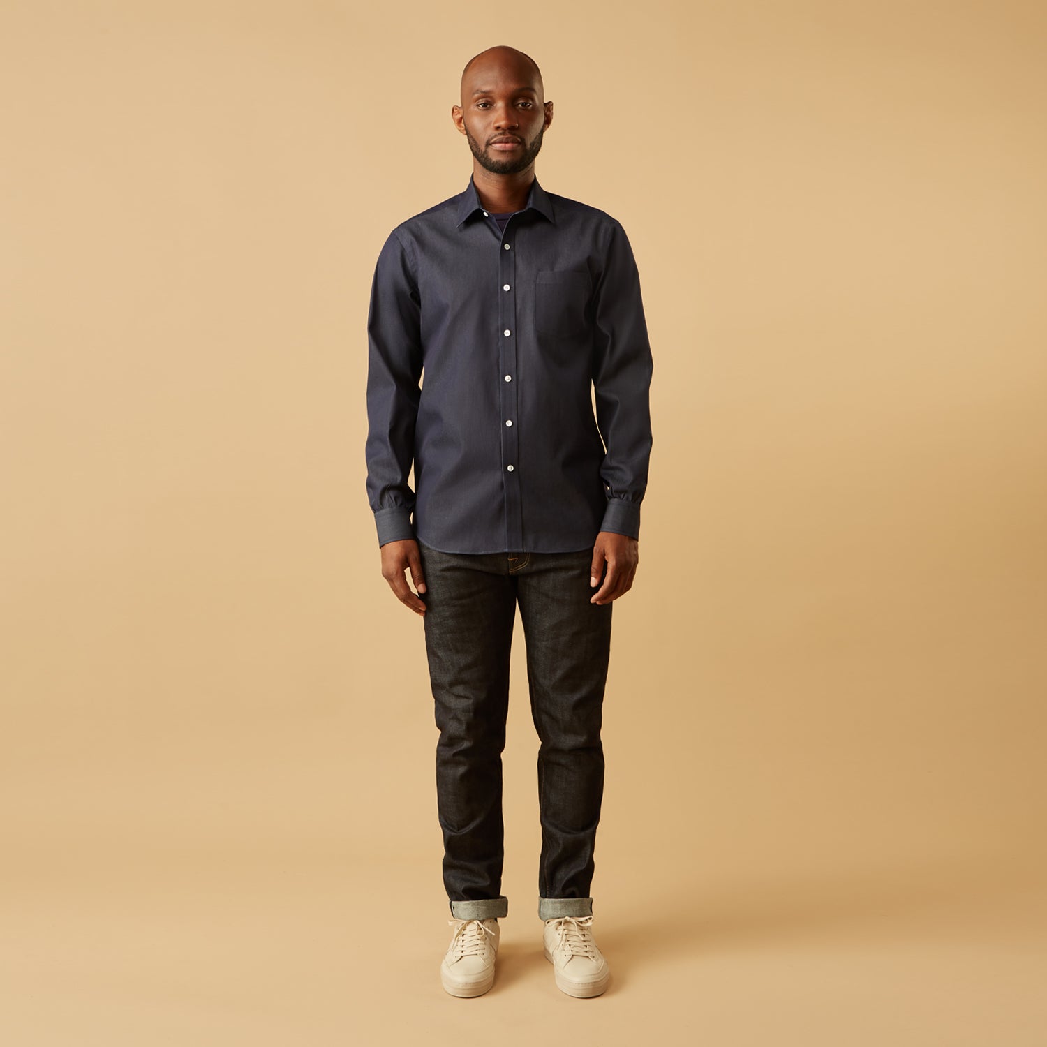 View 6 of product The Turnbull & Asser Blue Weekend Fit Finch Shirt features a Derby collar, chest pocket, classic white buttons, and timeless style, all in cotton. Laid flat on a white background.