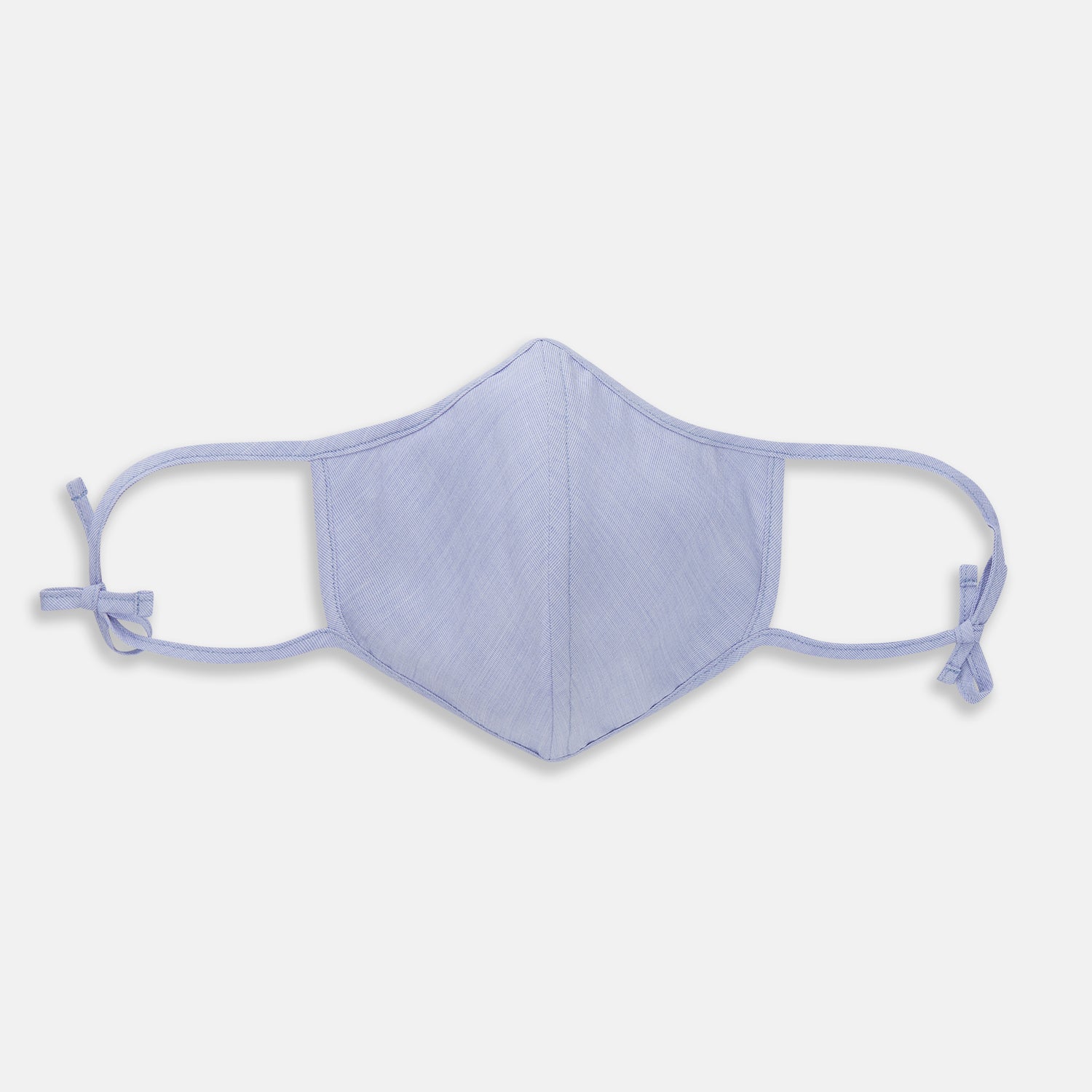 View 1 of product The Turnbull & Asser Plain Pale Blue Commuter Mask with 3 Viroformula™ filters features adjustable ear loops and side ties—ideal for daily use, shown against a white background.
