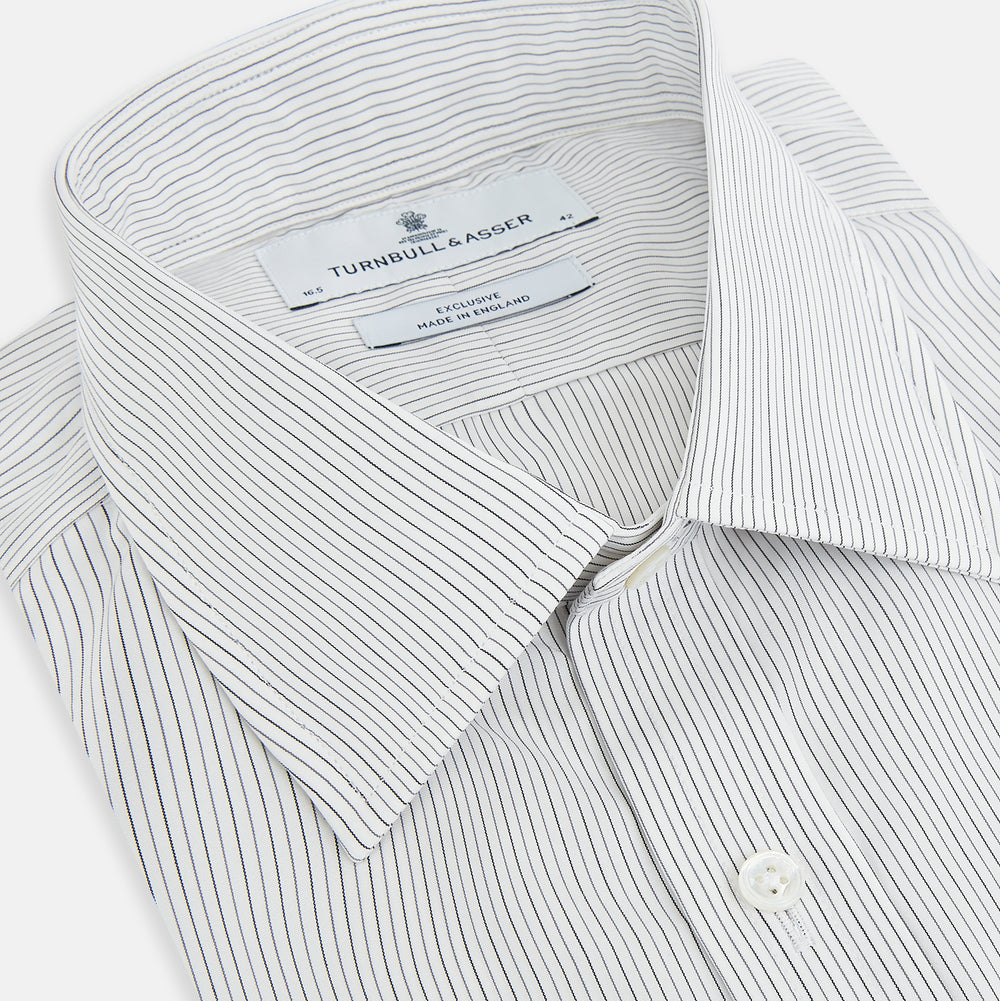 The Turnbull & Asser Midnight Blue and Grey Fine Stripe Mayfair Shirt features long sleeves, pure cotton fabric, a pointed collar, button-down front, and buttoned cuffs—ideal for formal wear.