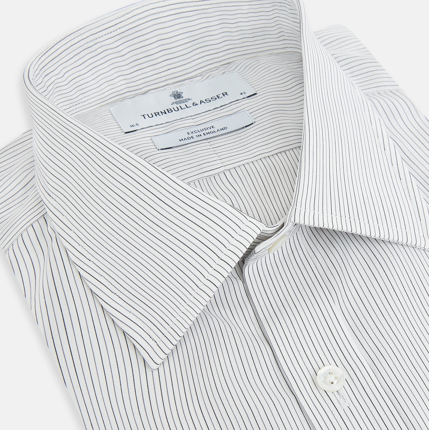 View 2 of product The Turnbull & Asser Midnight Blue and Grey Fine Stripe Mayfair Shirt features long sleeves, pure cotton fabric, a pointed collar, button-down front, and buttoned cuffs—ideal for formal wear.