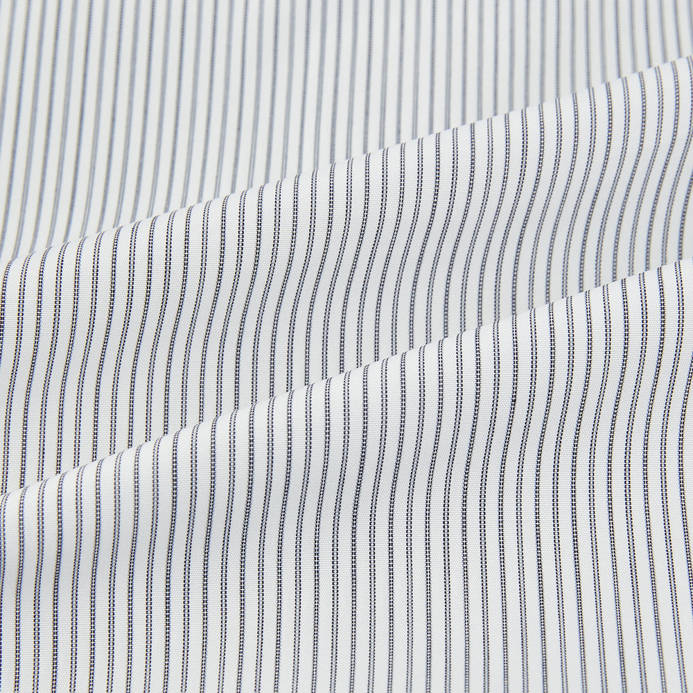 A long-sleeved Midnight Blue Fine Track Stripe Mayfair Shirt by Turnbull & Asser, featuring a T&A collar and white buttons, is laid neatly flat on a white background.