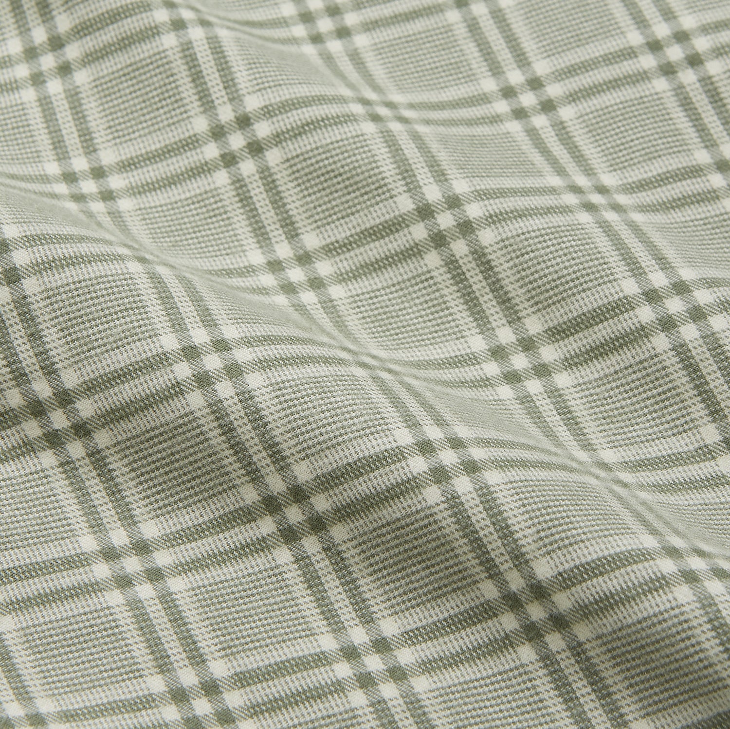 View 4 of product The Turnbull & Asser Green Check Modern Cotton Pyjama Set features a contemporary fit in white and green plaid, made from thicker cotton for added comfort.