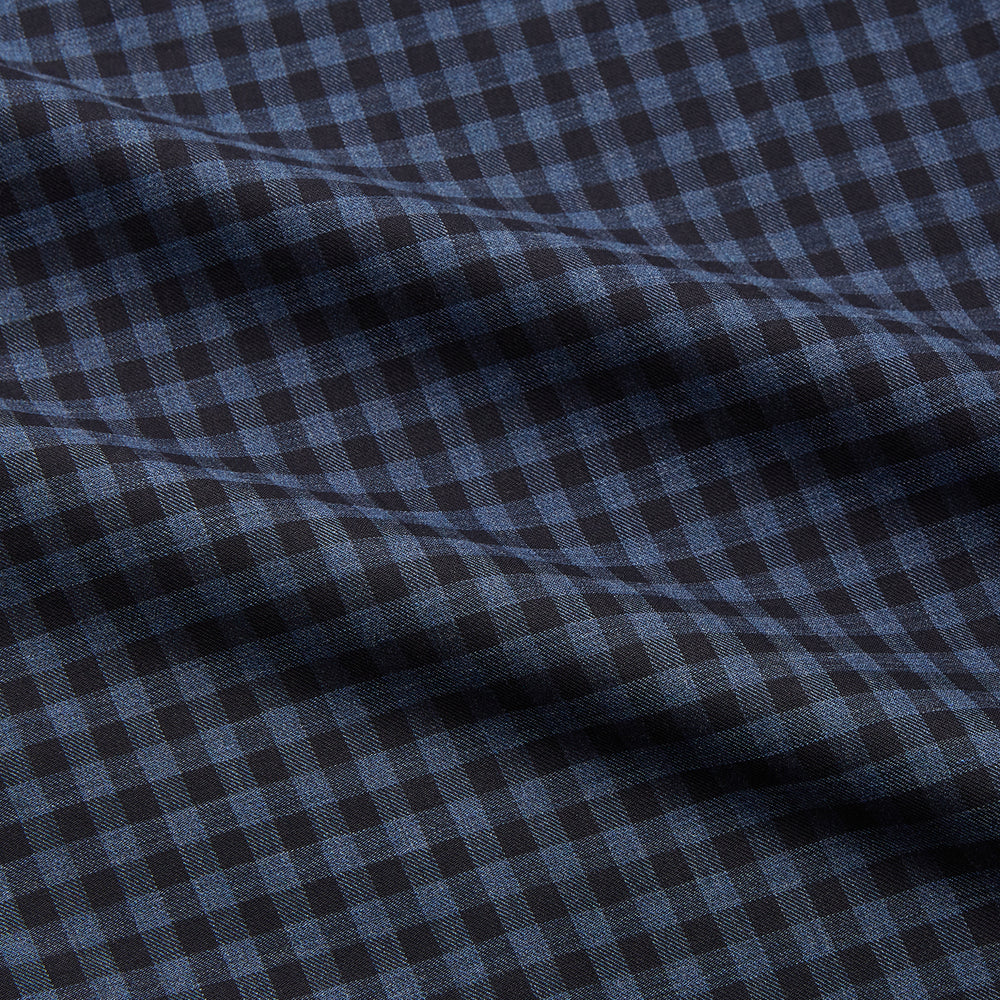 The Turnbull & Asser Navy Check Cotton Weekend Fit Blake Shirt features a long-sleeve, button-up design with a stand collar and white buttons, shown on a white background.