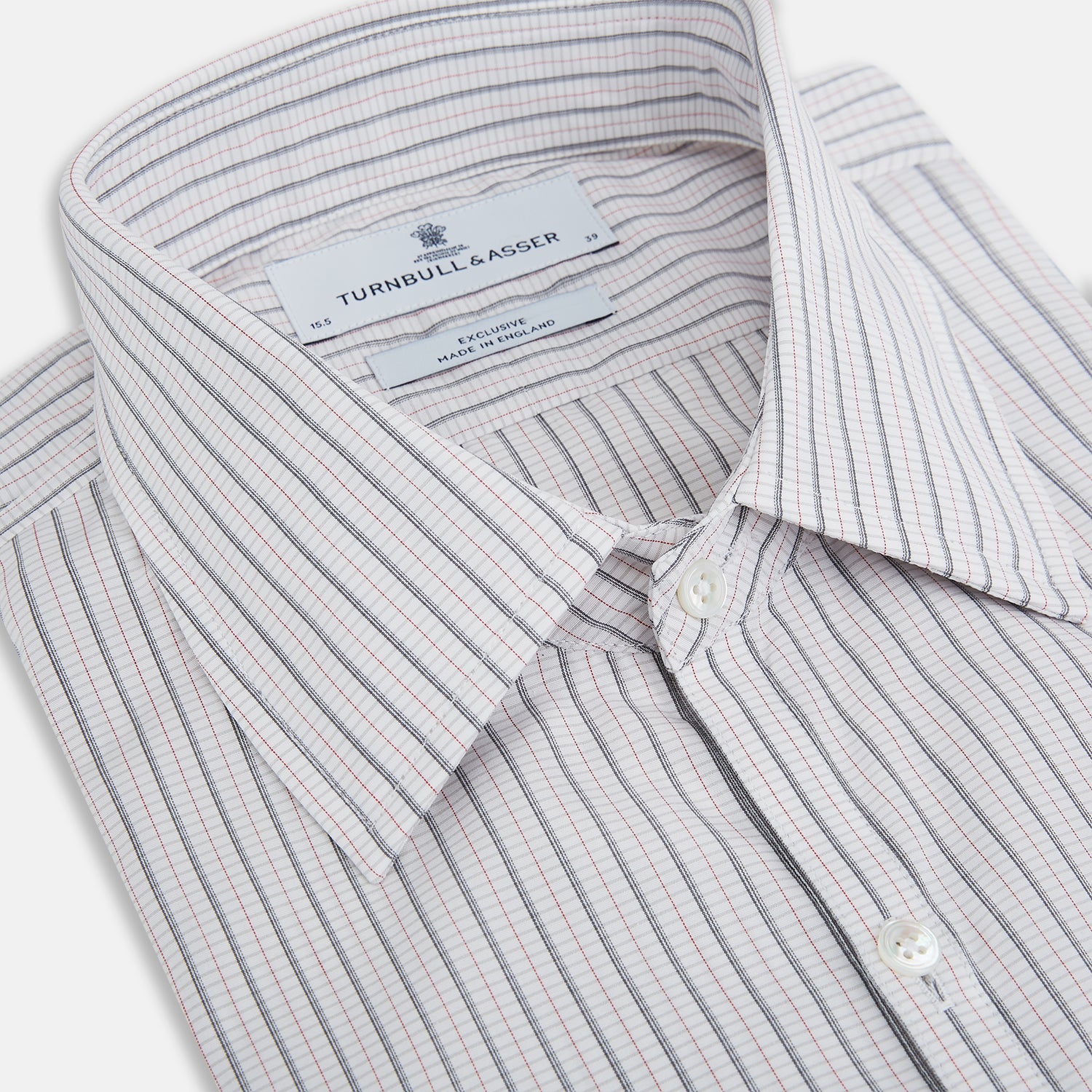 View 2 of product A red and navy graph check Westminster shirt by Turnbull & Asser with a formal collar and tailored fit, featuring a button-up front and buttoned cuffs, laid flat on a white background.