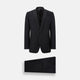 The Turnbull & Asser Black Single Breasted Dinner Suit features fine wool, a satin shawl collar jacket, and matching trousers—perfect formal wear, shown on a plain white background.