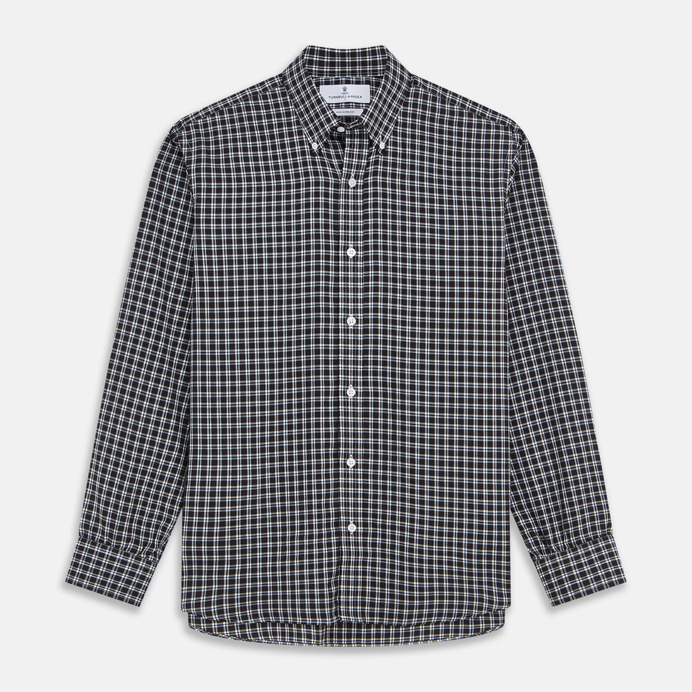 The Turnbull & Asser Black Multi Check Cotton Blend Weekend Fit Hayne Shirt features a Dorset button-down collar and white buttons, with a black and white plaid pattern, shown laid flat on a white background.
