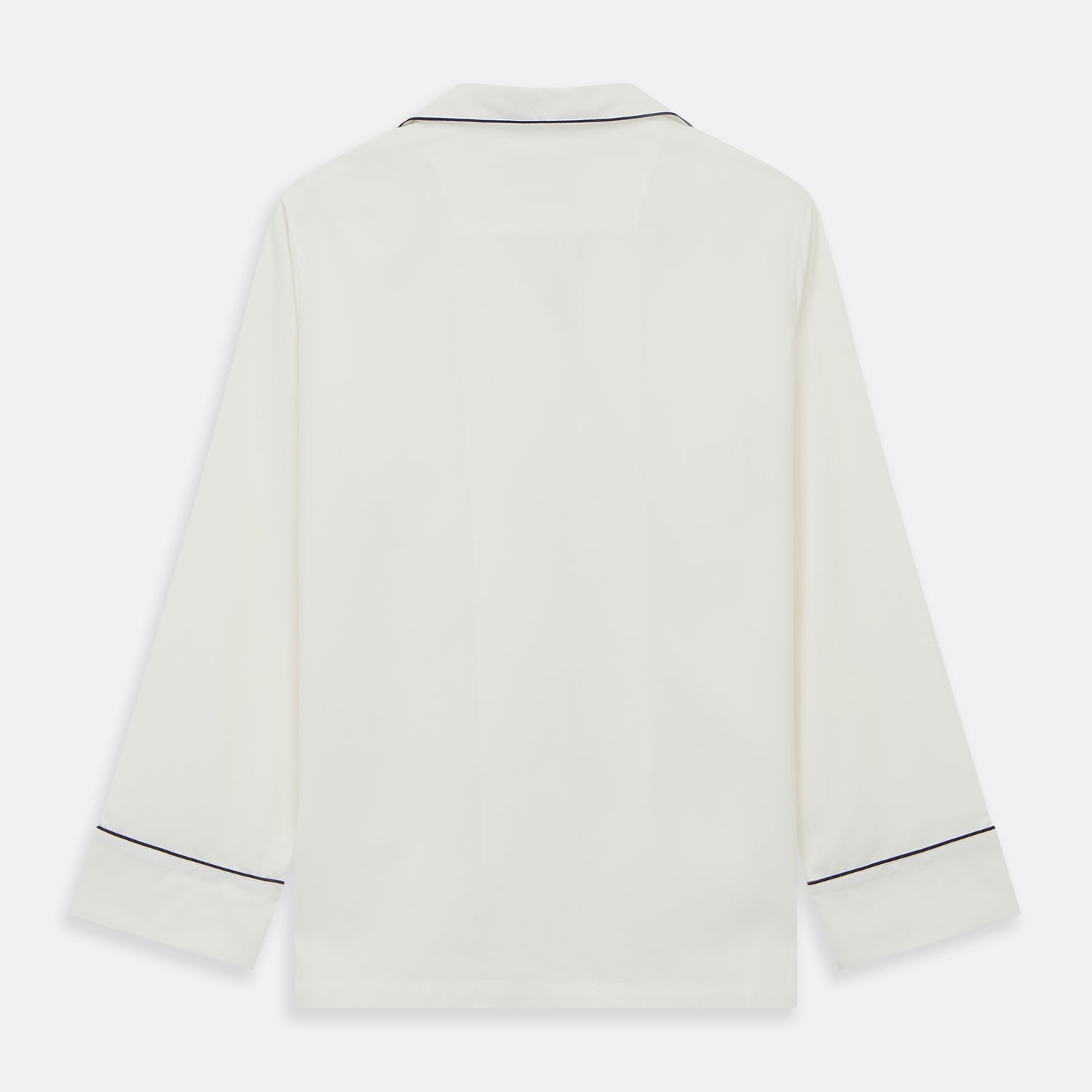 View 8 of product The Women's Harriet Cream Silk Pyjama Set by Turnbull & Asser features a white sand-washed silk button-up top with black piping and chest pocket, plus matching drawstring pants, all shown against a white background.