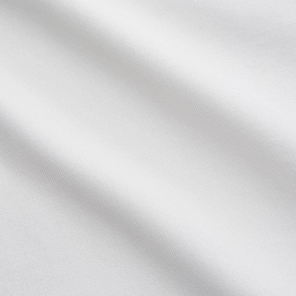 The White Cotton Weekend Fit Langston Shirt by Turnbull & Asser, with a Derby collar, long sleeves, and two button-flap chest pockets, is shown laid flat on a white background.
