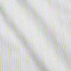 View 4 of product The Turnbull & Asser Yellow Multi Stripe Cotton Regular Fit Whitby Shirt features long sleeves, a classic collar, and thin yellow and blue stripes on white, displayed on a plain white surface.