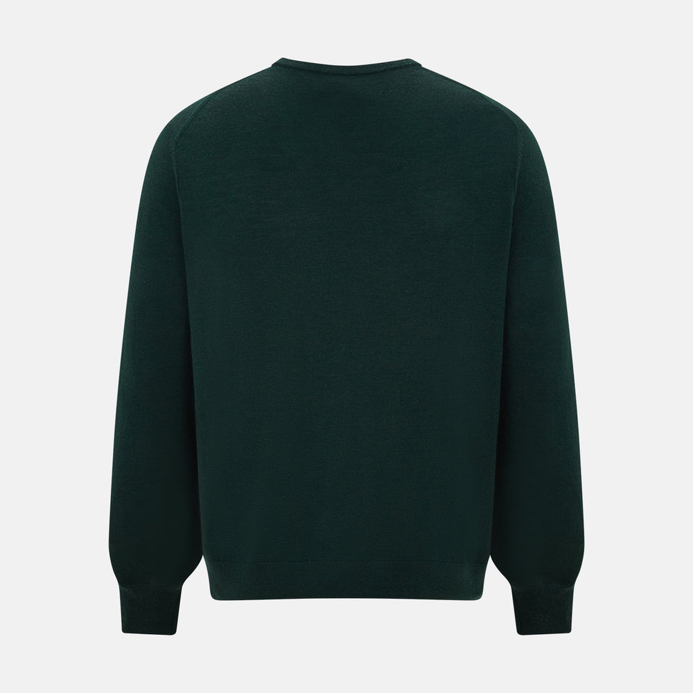 The Turnbull & Asser Petrol Green Merino V-Neck Jumper features long sleeves and ribbed cuffs and hem—an essential knitwear piece, shown against a white background.