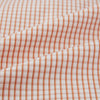 View 6 of product The Orange Micro Shadow Check Mayfair Shirt by Turnbull & Asser features a T&A collar, button-down front, and buttoned cuffs; crafted from Italian cotton in an orange and white check pattern, laid flat on a white background.