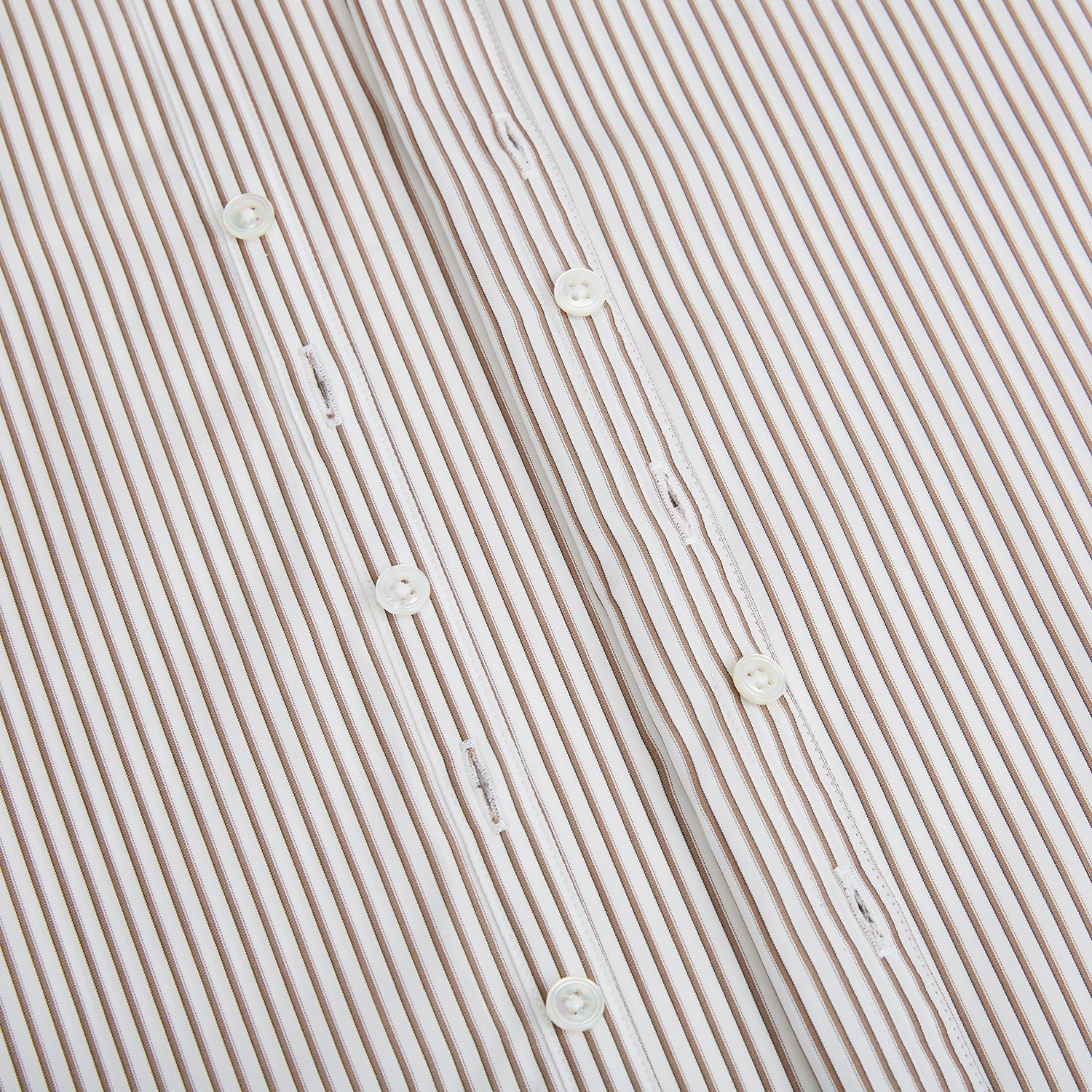 View 7 of product The Turnbull & Asser Coffee Multi Stripe Westminster Shirt features long sleeves, a button-up front, subtle beige and white stripes, a pointed Turnbull collar, and buttoned cuffs—expertly crafted in Britain and shown flat on a white background.