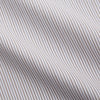 View 4 of product The Turnbull & Asser Sandstone Multi Stripe Cotton Tailored Fit Shelton Shirt features subtle vertical stripes, a pointed collar, and long sleeves, shown flat on a plain white background.