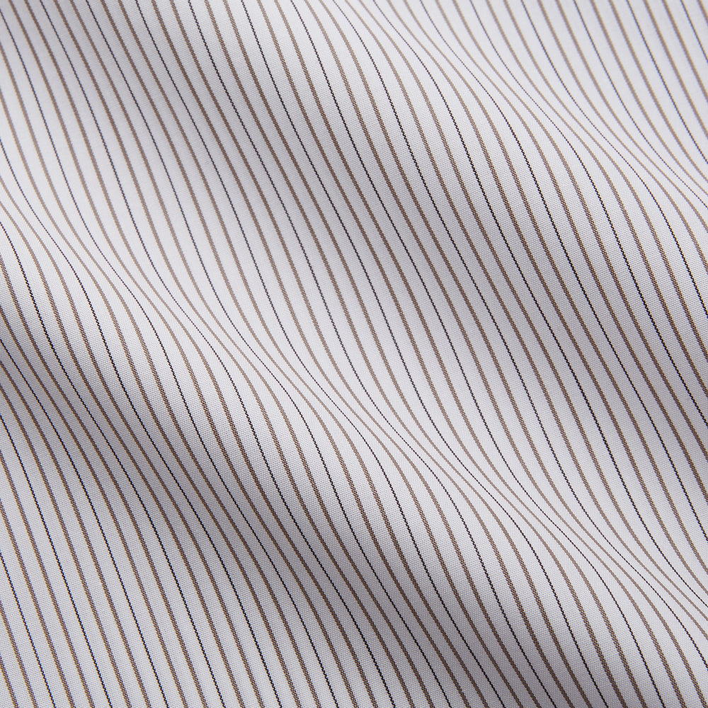 The Turnbull & Asser Sandstone Multi Stripe Cotton Tailored Fit Shelton Shirt features subtle vertical stripes, a pointed collar, and long sleeves, shown flat on a plain white background.