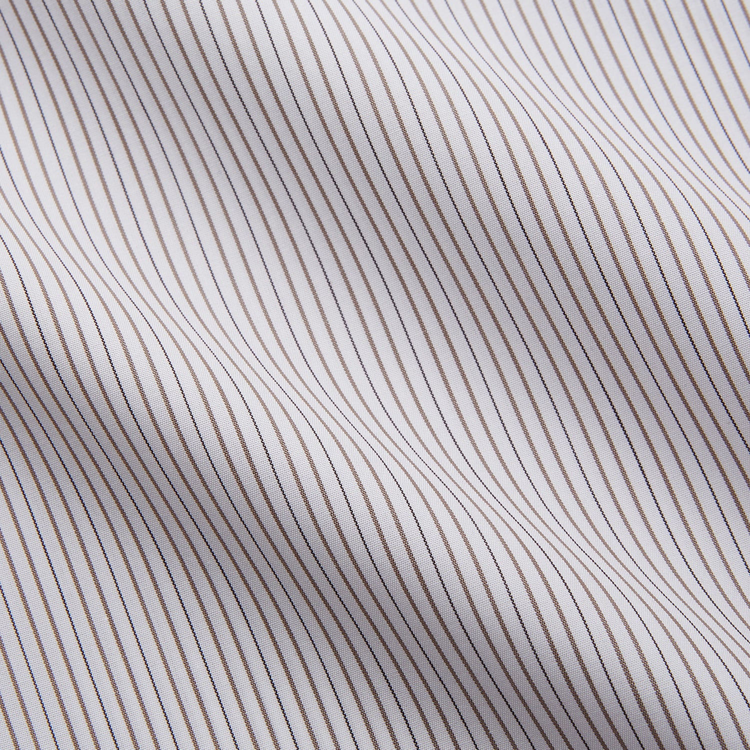 View 4 of product The Turnbull & Asser Sandstone Multi Stripe Cotton Tailored Fit Shelton Shirt features subtle vertical stripes, a pointed collar, and long sleeves, shown flat on a plain white background.