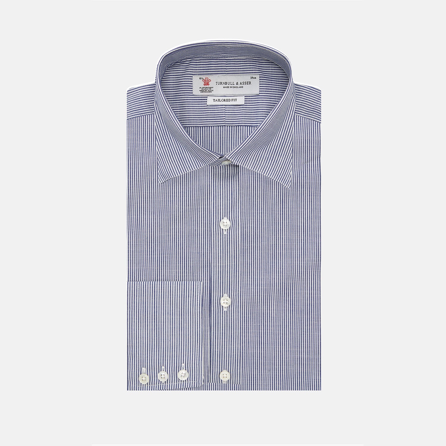 View 1 of product The Turnbull & Asser Navy and White Bengal Stripe Tailored Fit Shirt features blue and white vertical stripes, white buttons, and a streamlined silhouette, shown neatly folded against a plain white background.