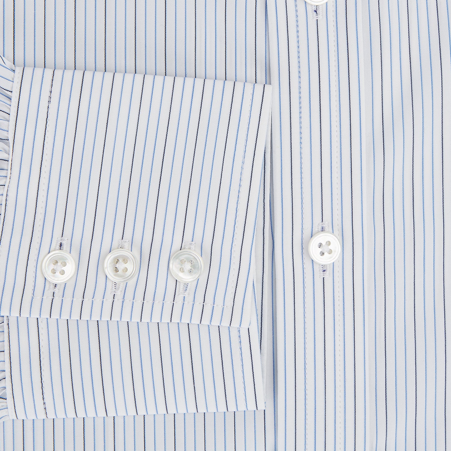 View 4 of product The Navy and Blue Pinstripe Mayfair Shirt by Turnbull & Asser, featuring a classic collar and crafted from premium Italian cotton, is shown against a white background.