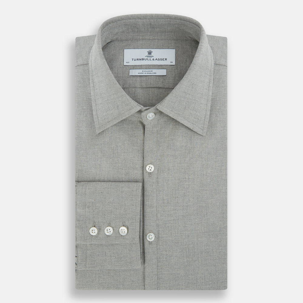 The Grey Westminster Shirt by Turnbull & Asser features a classic collar and white buttons, expertly crafted in Britain. This long-sleeve button-up is shown against a plain white background.
