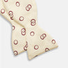 View 3 of product The Yellow Geometric Rings Silk Bow Tie by Turnbull & Asser features interlocking rings in a bold geometric pattern, crafted from silk.