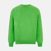 View 3 of product The Turnbull & Asser Lime Green Fine Merino V-Neck Jumper features ribbed cuffs and hem—a vibrant, standout knitwear choice for any wardrobe.