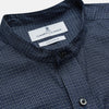 View 2 of product The Turnbull & Asser Navy Check Weekend Fit Flannel Shirt features a stand collar, button front, two chest pockets with flaps, and 1-button cuffs, crafted from soft Italian cotton and shown laid flat on a white background.