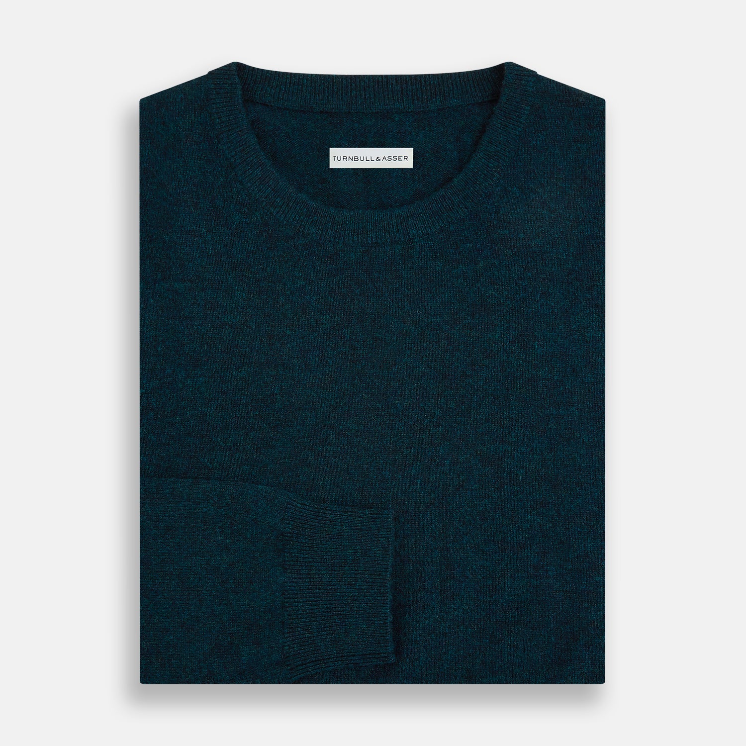 View 4 of product The Turnbull & Asser Dark Green Melange Cashmere Round Neck Jumper features long sleeves with ribbed cuffs and a ribbed hem, shown against a plain white background.