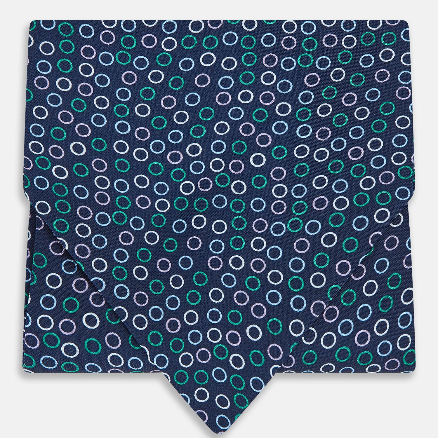 View 1 of product Turnbull & Asser's Multicoloured Dark Navy Circle Silk Cravat features blue, white, and green-outlined circles—ideal for weddings or pairing with classic British attire.