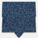Turnbull & Asser's Multicoloured Dark Navy Circle Silk Cravat features blue, white, and green-outlined circles—ideal for weddings or pairing with classic British attire.