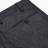 View 2 of product Turnbull & Asser Charcoal Wool Single Pleated Gerry Trousers shown on a white background, featuring a button and zipper closure, belt loops, and straight legs.