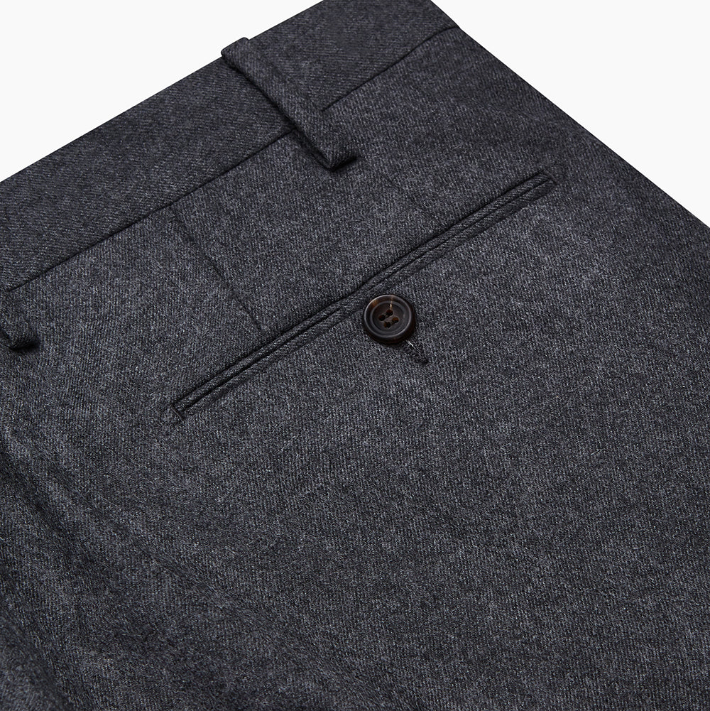 Turnbull & Asser Charcoal Wool Single Pleated Gerry Trousers shown on a white background, featuring a button and zipper closure, belt loops, and straight legs.