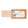 View 2 of product The Brown Leather Luggage Tag by Turnbull & Asser features textured brown leather, a silver buckle strap, and the Turnbull & Asser name embossed in silver at the bottom.