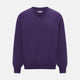 The Turnbull & Asser Purple Cashmere Round Neck Jumper features long sleeves, ribbed cuffs, hem, and collar for an elegant silhouette. This versatile knitwear piece is shown against a white background.