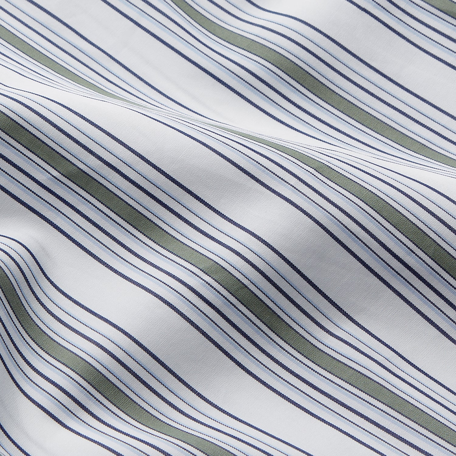View 4 of product The Turnbull & Asser Green Multi Stripe Regular Fit Shirt features a T&A collar, 3 button cuffs, long sleeves, and vertical blue, green, and white stripes. Laid flat on a white background.
