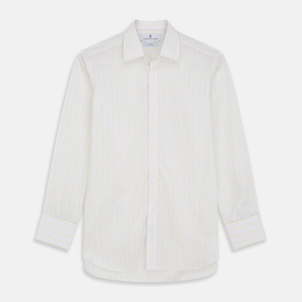 The Turnbull & Asser Yellow Multi Stripe Cotton Regular Fit Whitby Shirt features long sleeves, a classic collar, and thin yellow and blue stripes on white, displayed on a plain white surface.