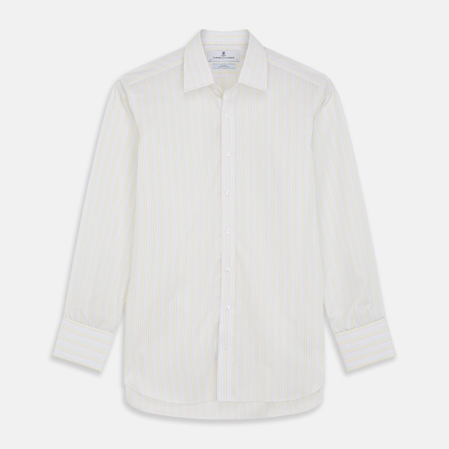 View 1 of product The Turnbull & Asser Yellow Multi Stripe Cotton Regular Fit Whitby Shirt features long sleeves, a classic collar, and thin yellow and blue stripes on white, displayed on a plain white surface.