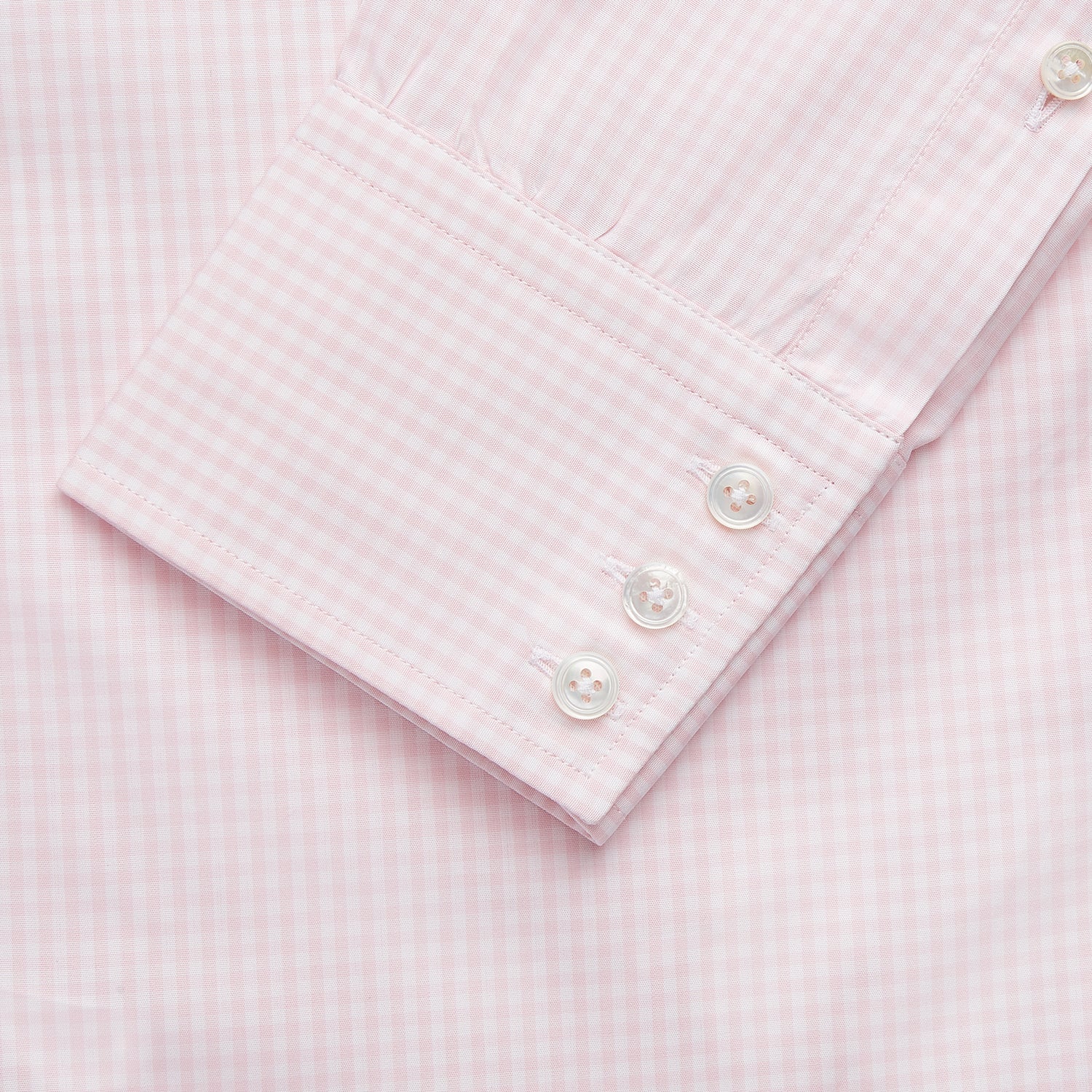 View 3 of product The Turnbull & Asser Pink Windowpane Check Shirt features long sleeves, a button-down front, pointed collar, and buttoned cuffs—an elegant addition to any formal shirt collection.