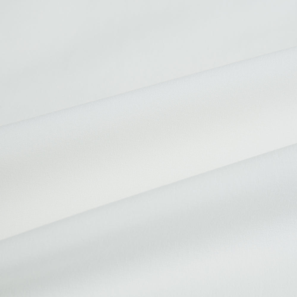 The Turnbull & Asser Plain White Windsor Shirt features a Turnbull open collar, 3-button cuffs, and relaxed fit—exemplifying British craftsmanship. Displayed on a white background.