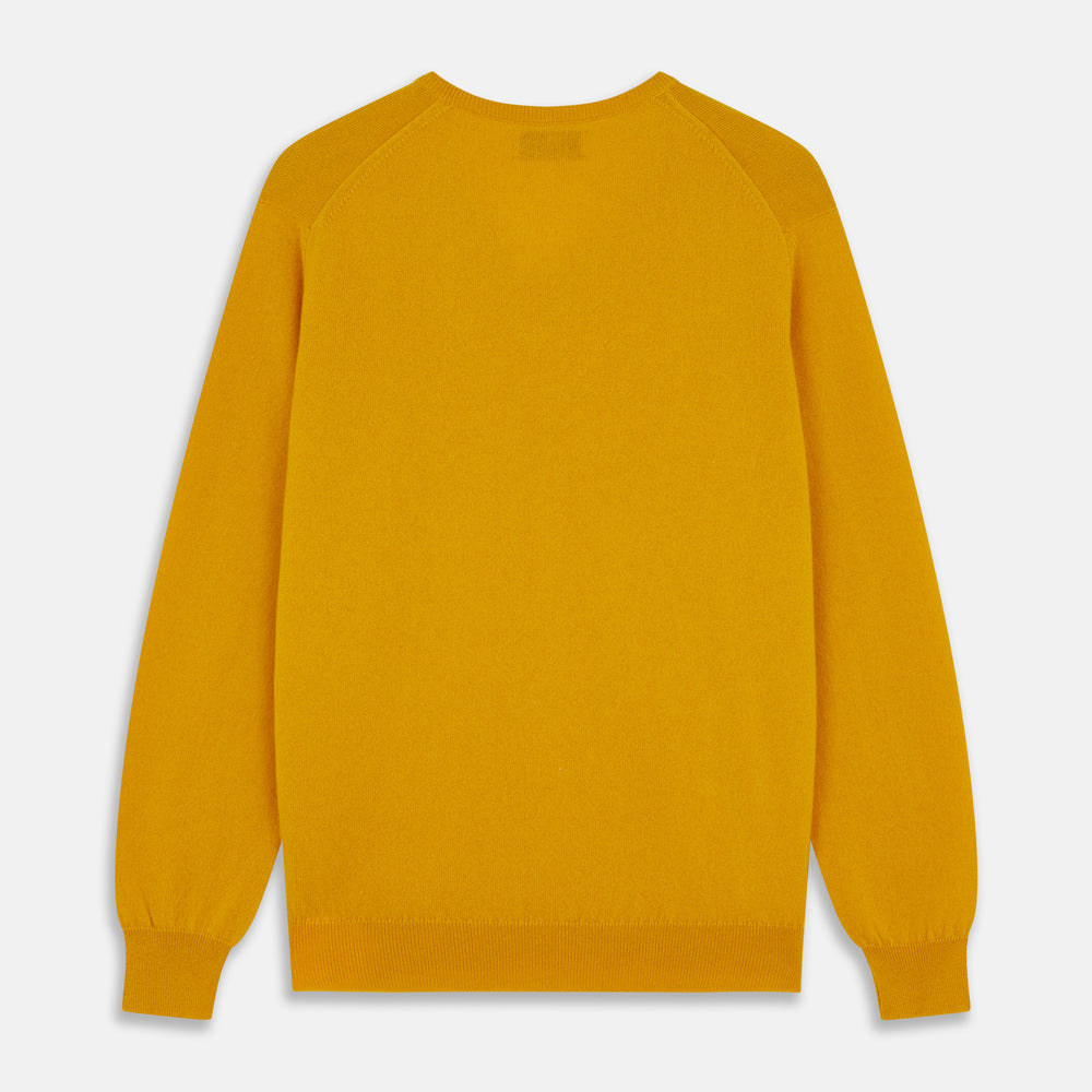 The Gold Paden Cashmere V-Neck Jumper by Turnbull & Asser features a bright yellow hue, long sleeves, ribbed cuffs and hem, and a classic design. It is shown laid flat on a white background.