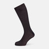 View 1 of product The Turnbull & Asser Smoke Mid-Length Sock, in black with a ribbed design, is displayed upright on a white background to highlight its refined comfort and coverage from toe to cuff.