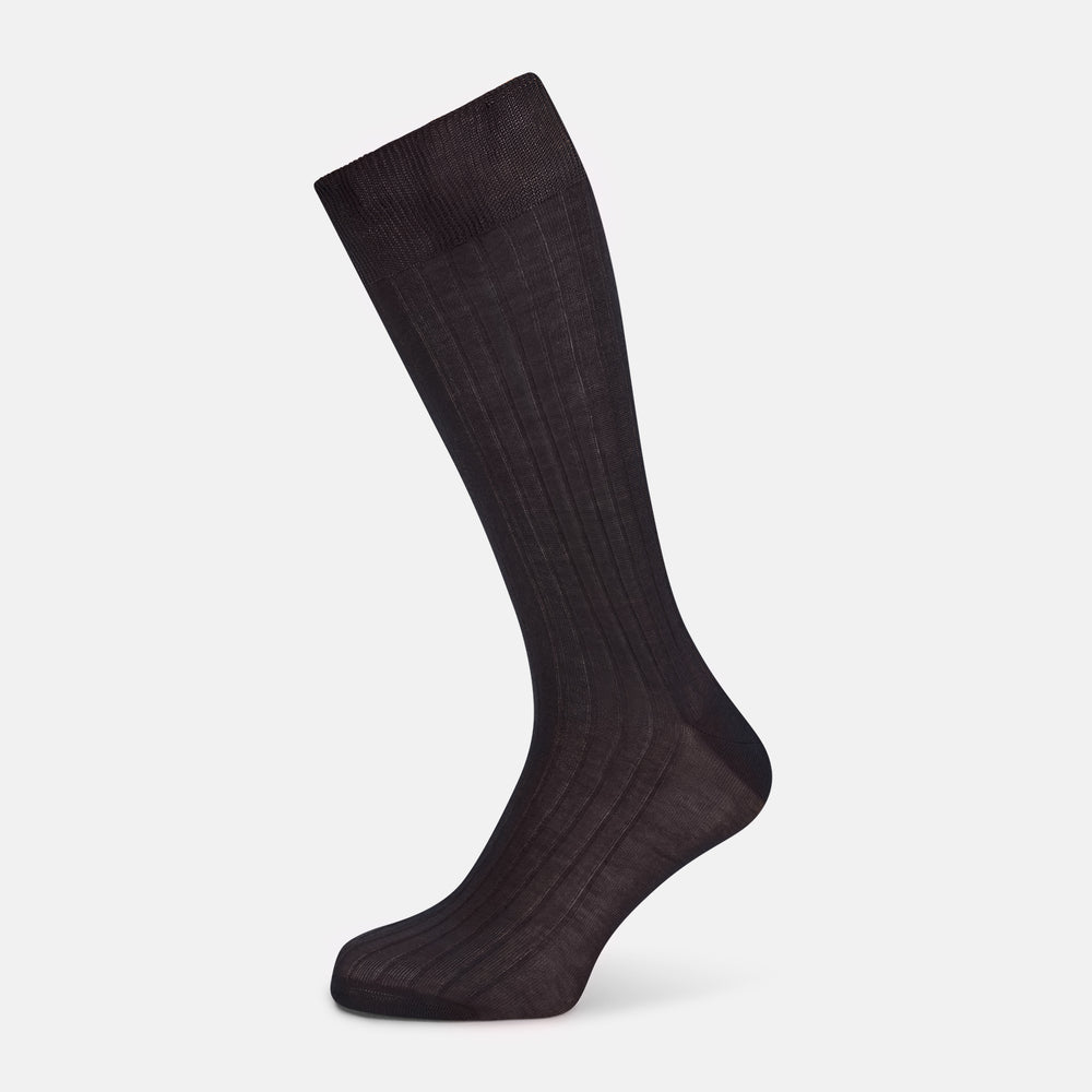 The Turnbull & Asser Smoke Mid-Length Sock, in black with a ribbed design, is displayed upright on a white background to highlight its refined comfort and coverage from toe to cuff.