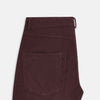 View 5 of product The Turnbull & Asser Burgundy Corduroy Charles Trousers are straight-leg stretch cotton pants in dark burgundy, featuring side and back pockets, shown against a plain white background.