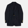 View 1 of product The Turnbull & Asser Navy Plain Wool Single Breasted Blazer features gold buttons, a notched lapel, and multiple pockets, and is shown against a white background.