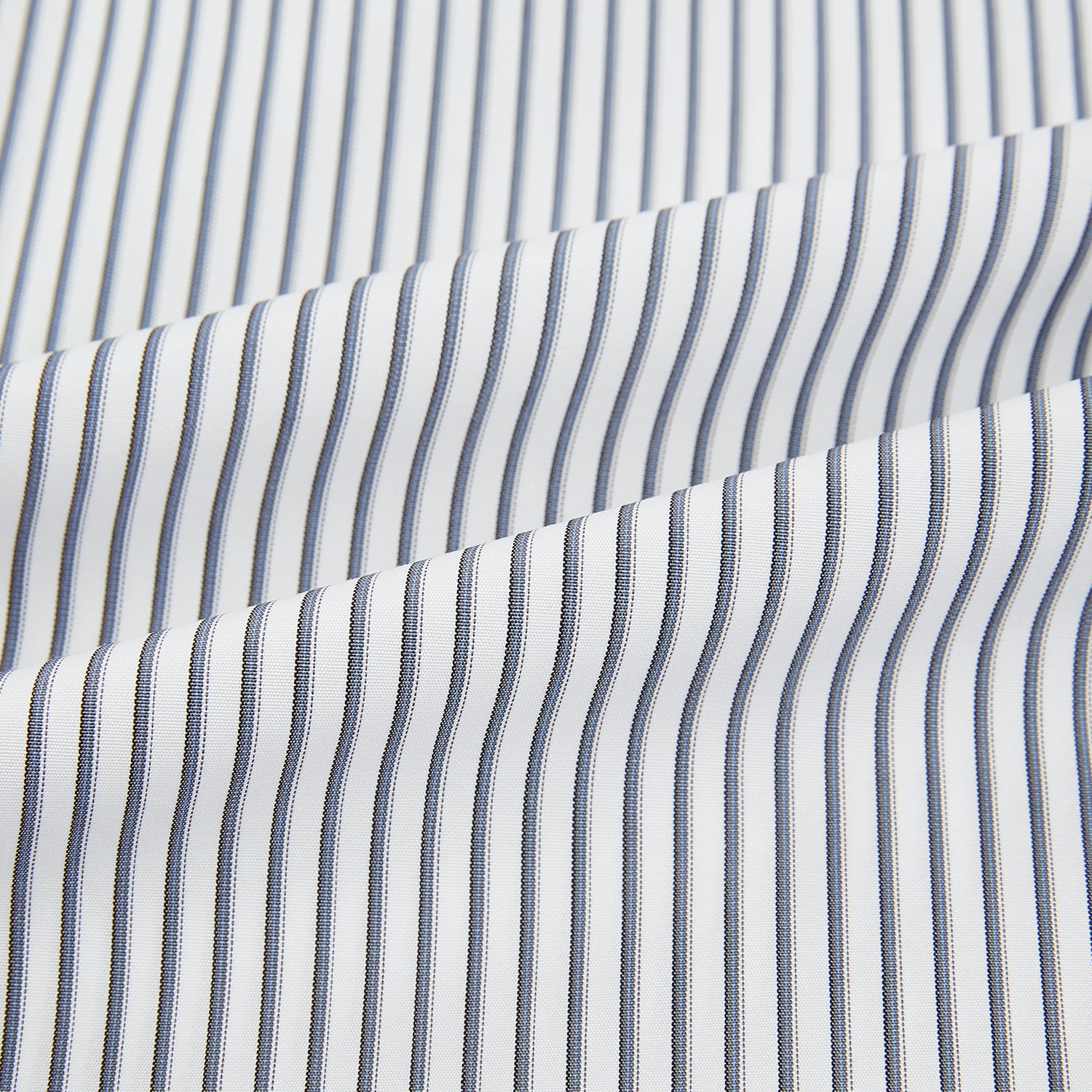 View 6 of product The Turnbull & Asser Grey Multi Stripe Mayfair Shirt features long sleeves, a classic collar, and thin vertical stripes in black and white, shown laid flat on a white background.