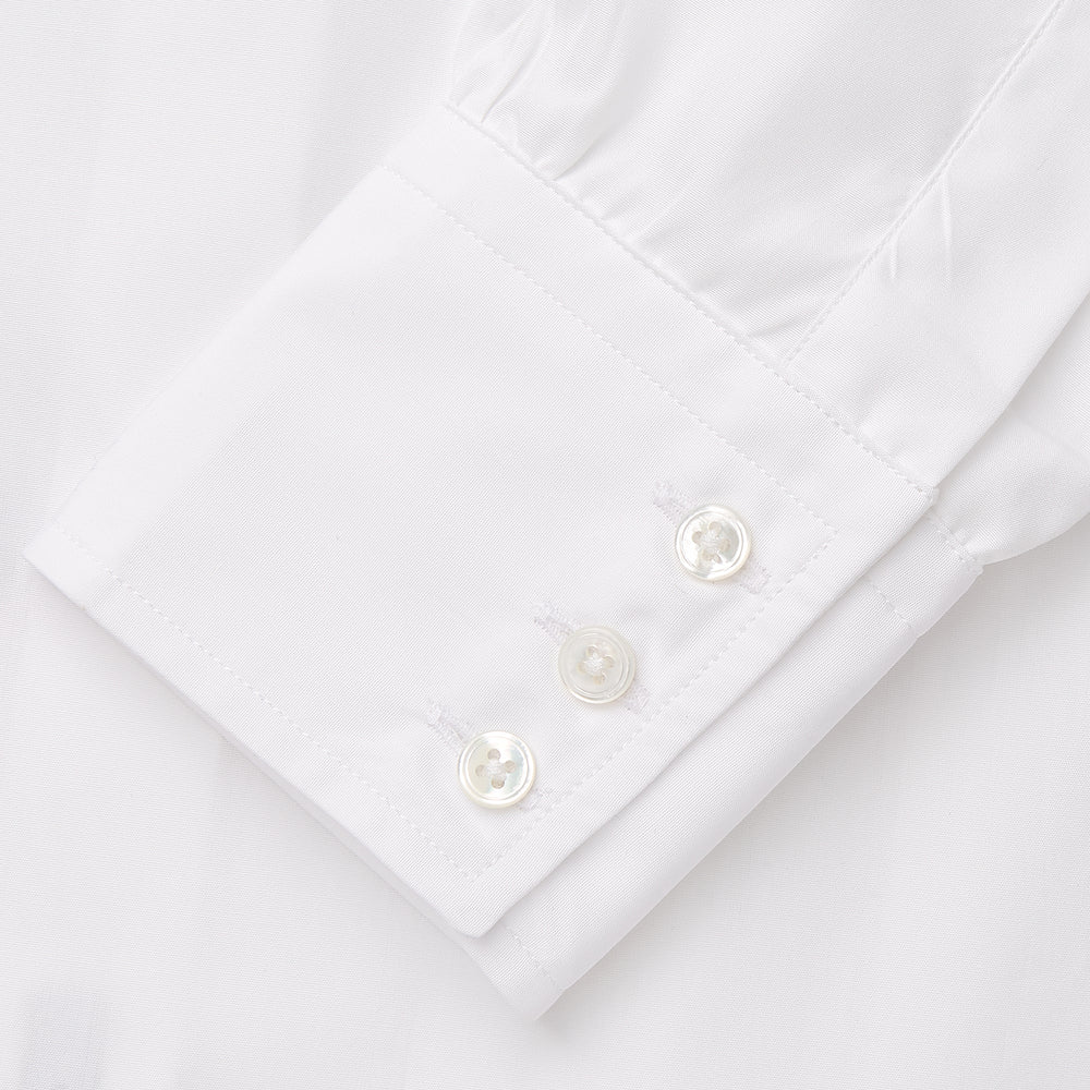 The White Cotton Tailored Bianca Shirt by Turnbull & Asser features a pointed collar and button cuffs, crafted from soft organic cotton and displayed flat on a white background for timeless elegance.