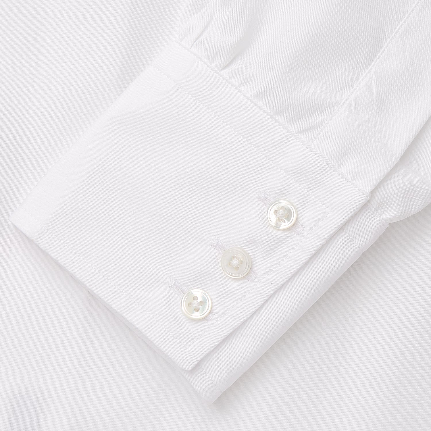 View 3 of product The White Cotton Tailored Bianca Shirt by Turnbull & Asser features a pointed collar and button cuffs, crafted from soft organic cotton and displayed flat on a white background for timeless elegance.