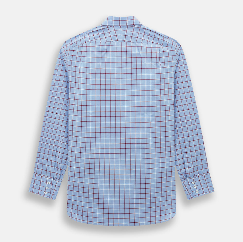 The Turnbull & Asser Blue and Burgundy Windowpane Mayfair Shirt features long sleeves, a light blue base with burgundy windowpane checks, a classic collar, and white buttons.