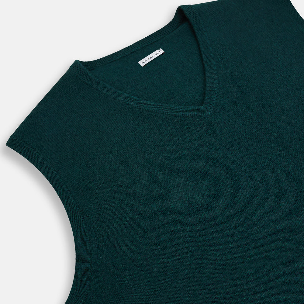 The Turnbull & Asser Moss Green Cashmere V-Neck Vest is a men's sleeveless knit sweater with a classic silhouette, shown against a plain white background.