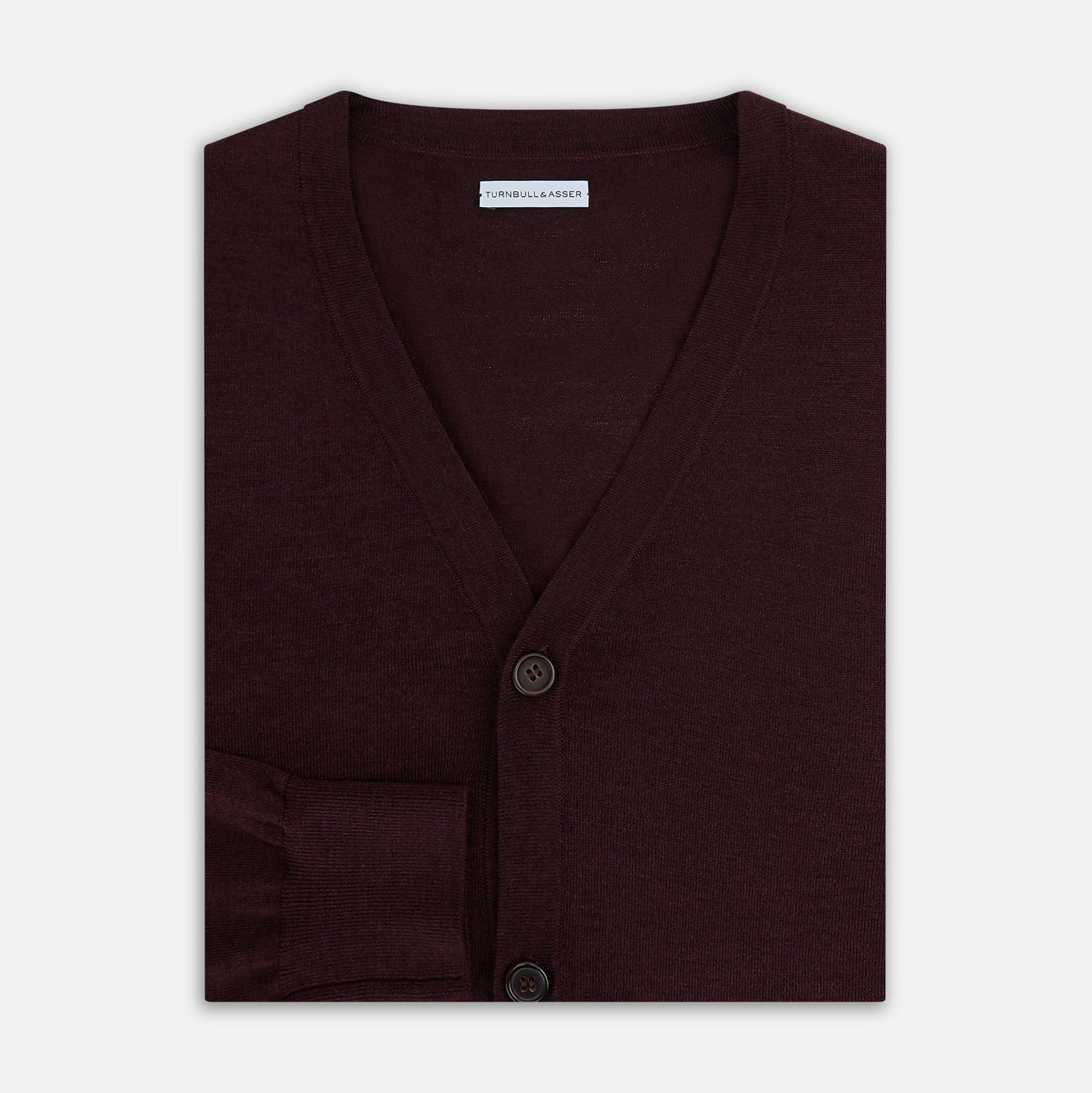 View 4 of product The Turnbull & Asser Burgundy Fine Merino V-Neck Cardigan features long sleeves and a button-down front, highlighting elegant handcrafted knitwear against a plain white background.